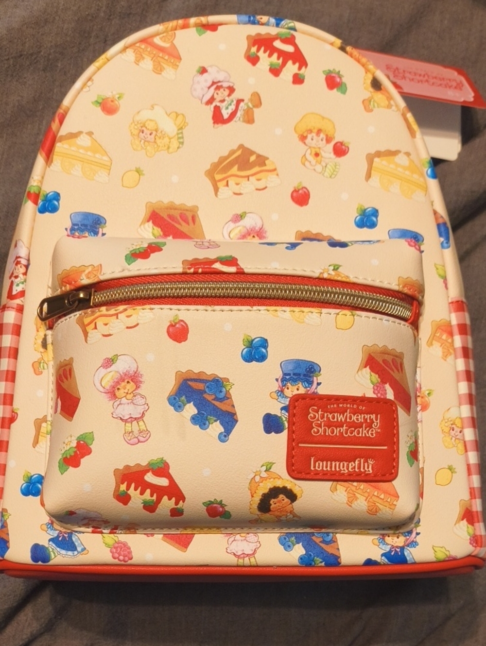 Loungefly Cream Mini Backpack with Red, Blue, Yellow, Pink, Green Accents